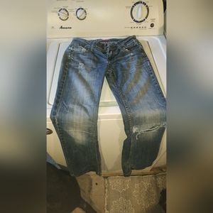 Blue ripped flare jeans